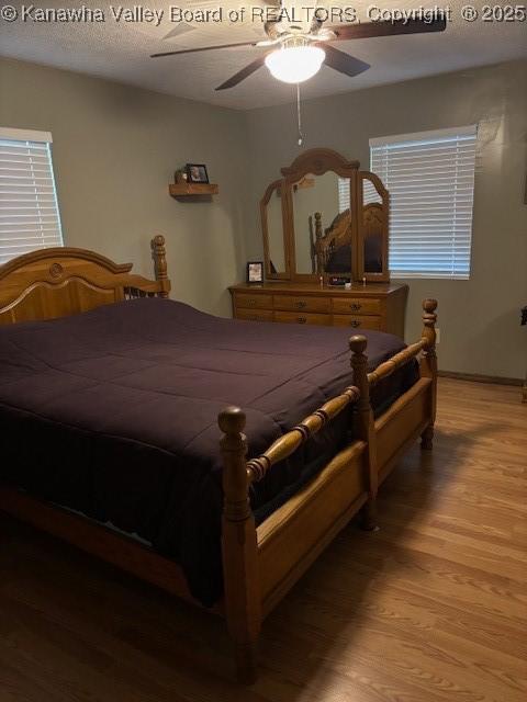 5222 Dalewood Dr, Charleston, WV 25313 - bedroom featuring light wood-type flooring and ceiling fan