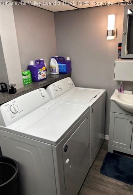 5222 Dalewood Dr, Charleston, WV 25313 - laundry area featuring separate washer and dryer and dark wood finished floors
