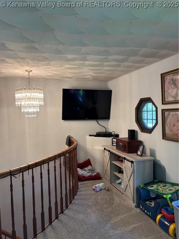 5222 Dalewood Dr, Charleston, WV 25313 - carpeted living room with a chandelier