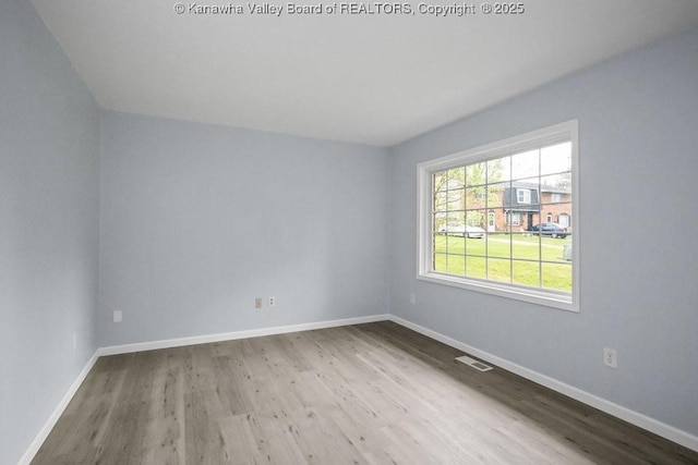 302 Charles Ct, Hurricane, WV 25526 - spare room featuring wood finished floors and baseboards
