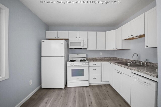 302 Charles Ct, Hurricane, WV 25526 - kitchen featuring white appliances, a sink, white cabinetry, and light wood-type flooring
