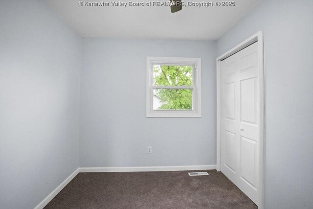 302 Charles Ct, Hurricane, WV 25526 - unfurnished bedroom with carpet, baseboards, and a closet