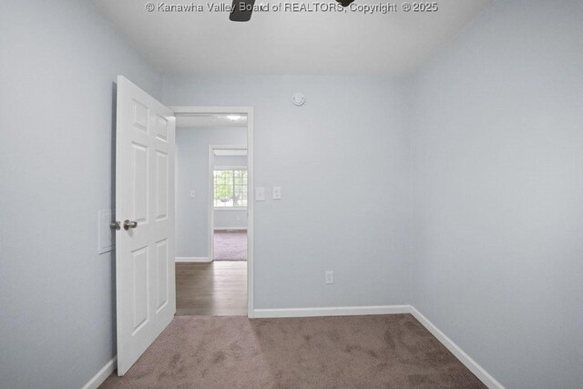 302 Charles Ct, Hurricane, WV 25526 - empty room featuring baseboards, carpet flooring, and a ceiling fan