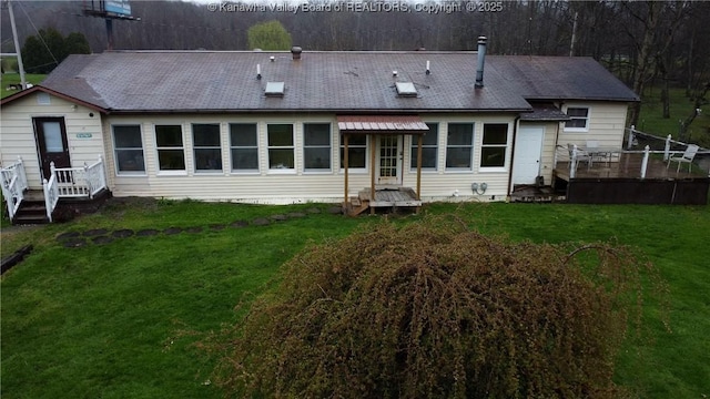 28 Tracy Ln, Summersville, WV 26651 - rear view of house with a yard and a wooden deck
