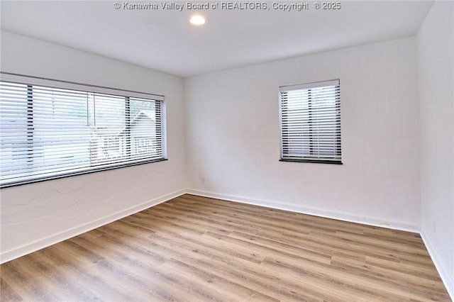 4010 Virginia Ave SE, Charleston, WV 25304 - empty room with light wood-type flooring, baseboards, and recessed lighting