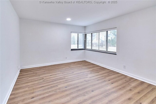 4010 Virginia Ave SE, Charleston, WV 25304 - empty room with wood finished floors, baseboards, and recessed lighting