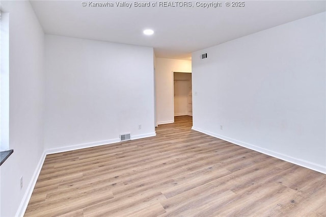 4010 Virginia Ave SE, Charleston, WV 25304 - unfurnished room with baseboards, wood finished floors, and recessed lighting