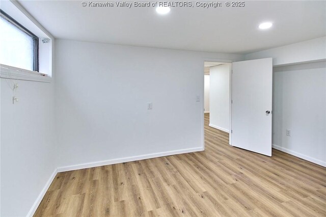 4010 Virginia Ave SE, Charleston, WV 25304 - below grade area with baseboards, light wood finished floors, and recessed lighting