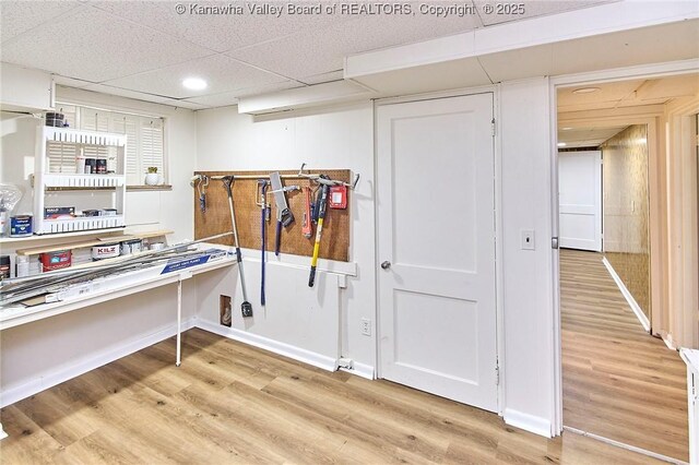 4010 Virginia Ave SE, Charleston, WV 25304 - miscellaneous room with light wood finished floors, a drop ceiling, recessed lighting, and baseboards