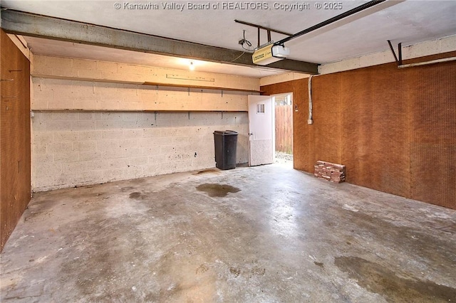 4010 Virginia Ave SE, Charleston, WV 25304 - garage featuring a garage door opener