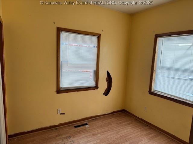 311 1/2 Westmoreland Dr, Charleston, WV 25302 - unfurnished room with light wood finished floors and baseboards