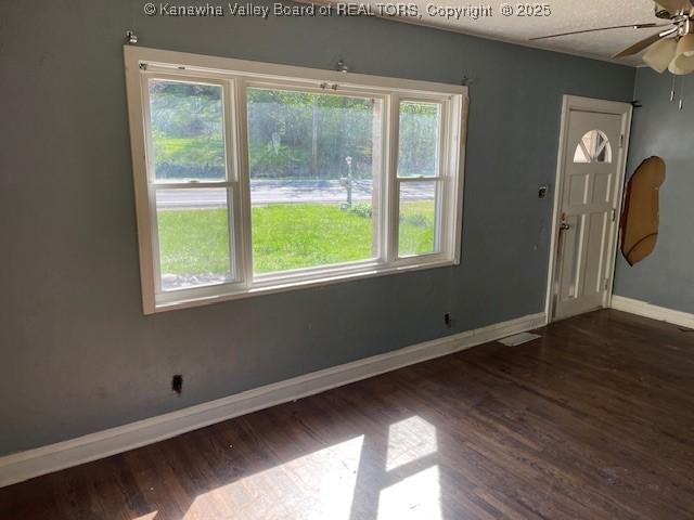 4866 Washington St W, Charleston, WV 25313 - foyer entrance featuring baseboards, wood finished floors, and ceiling fan