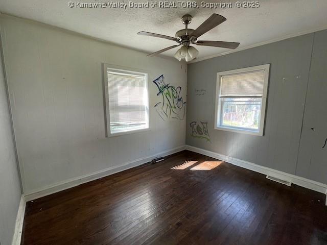 4866 Washington St W, Charleston, WV 25313 - empty room featuring wood finished floors, ceiling fan, baseboards, and a textured ceiling