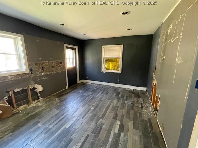 4866 Washington St W, Charleston, WV 25313 - empty room with plenty of natural light and wood finished floors