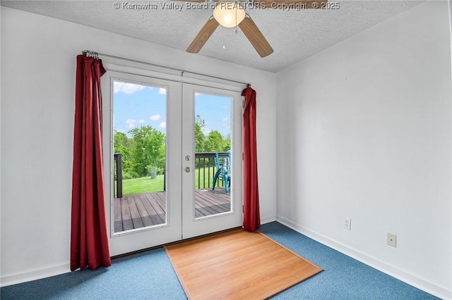 doorway to outside with french doors, carpet, plenty of natural light, and a textured ceiling
