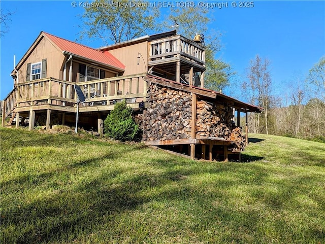 6531 Lockbridge Rd, Wv, WV 25976 - back of house with a yard, metal roof, and a wooden deck