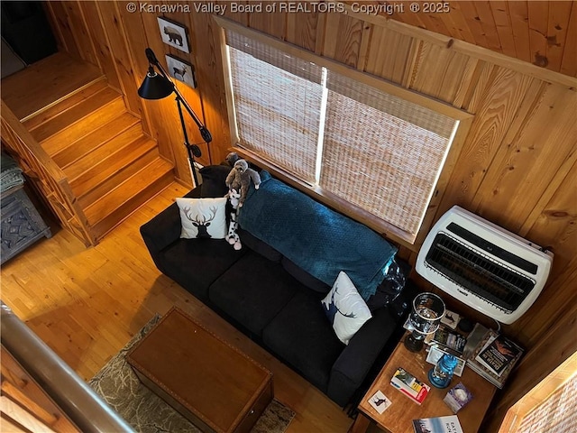 6531 Lockbridge Rd, Wv, WV 25976 - living area with heating unit, wood finished floors, wooden walls, and stairs