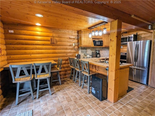6531 Lockbridge Rd, Wv, WV 25976 - kitchen with stainless steel appliances, wooden ceiling, decorative backsplash, light countertops, and recessed lighting