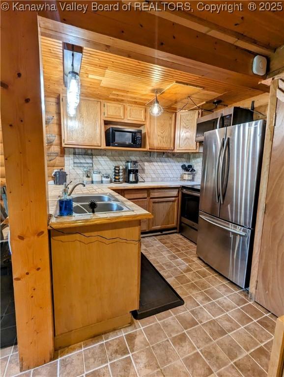 6531 Lockbridge Rd, Wv, WV 25976 - kitchen featuring appliances with stainless steel finishes, wood ceiling, backsplash, light countertops, and a sink