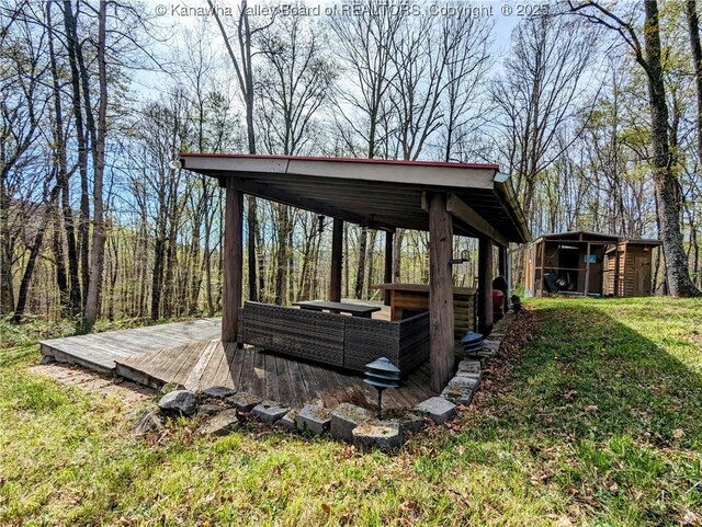 6531 Lockbridge Rd, Wv, WV 25976 - view of green lawn with an outdoor structure, a deck, and a shed