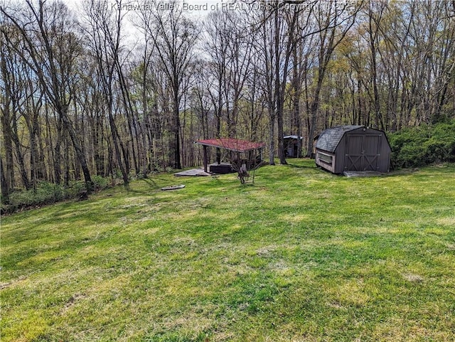 6531 Lockbridge Rd, Wv, WV 25976 - view of green lawn with a shed and an outbuilding