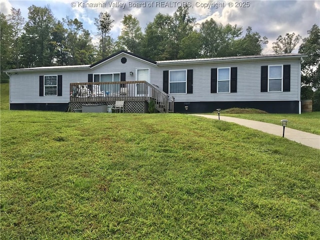 728 Honeycutt Rd, Fraziers Bottom, WV 25082 - manufactured / mobile home featuring a deck and a front lawn