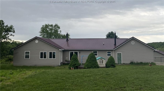 5860 Union Campground Rd, Letart, WV 25253 - rear view of house featuring a lawn and metal roof
