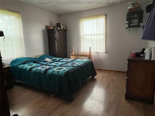 5860 Union Campground Rd, Letart, WV 25253 - bedroom with wood finished floors and baseboards