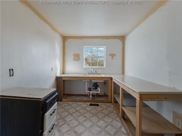 1302 Adele St, Charleston, WV 25302 - office area with a sink and light flooring