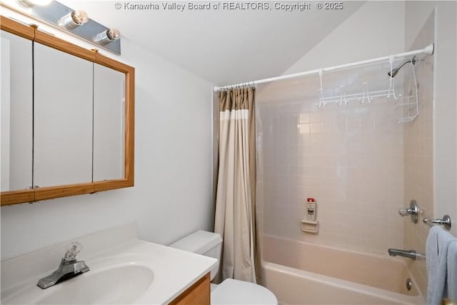 12 W Coventry Rd, South Charleston, WV 25309 - bathroom with shower / bath combo with shower curtain, vanity, toilet, and lofted ceiling