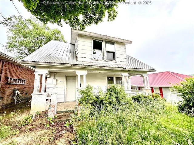 324 High School Ave, Hurricane, WV 25526 - bungalow featuring covered porch and metal roof