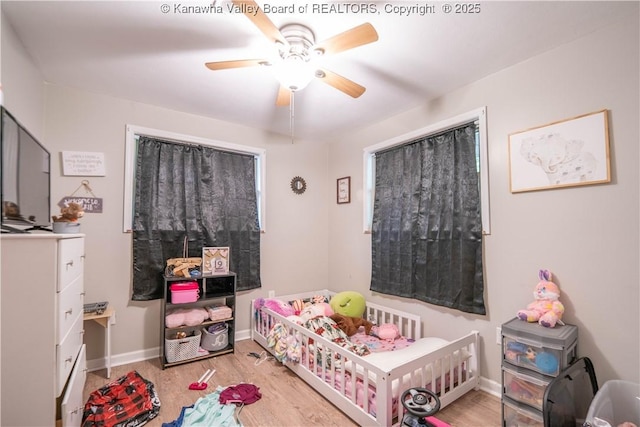 2611 Larwood Dr, Charleston, WV 25302 - bedroom featuring wood finished floors, ceiling fan, and baseboards