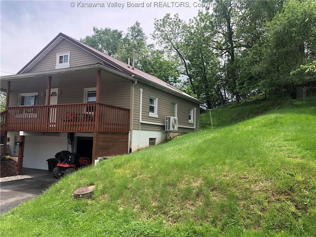 329 3rd Ave, Ripley, WV 25271 - view of home's exterior with ac unit, a yard, covered porch, and driveway