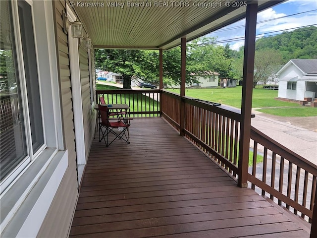 329 3rd Ave, Ripley, WV 25271 - deck featuring covered porch and a yard
