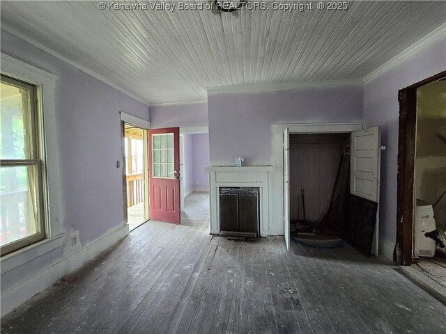 1620 Red Oak St, Charleston, WV 25387 - unfurnished living room with crown molding, wood-type flooring, and a fireplace
