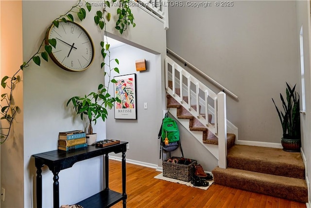 5427 Hillbrook Dr, Charleston, WV 25313 - stairway featuring wood finished floors and baseboards