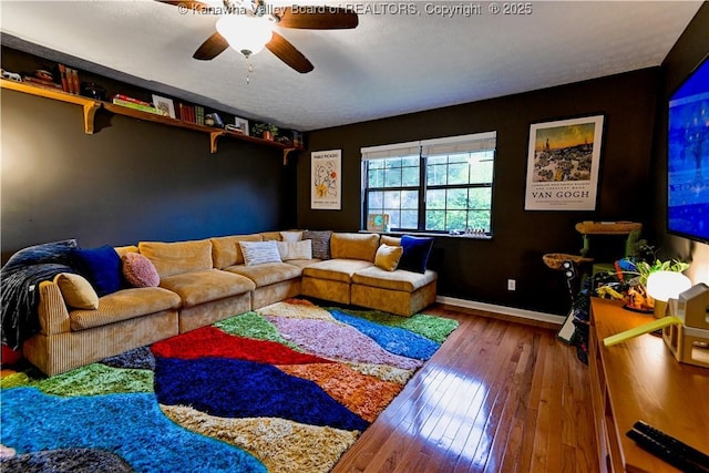 5427 Hillbrook Dr, Charleston, WV 25313 - living area with hardwood / wood-style flooring, ceiling fan, and baseboards