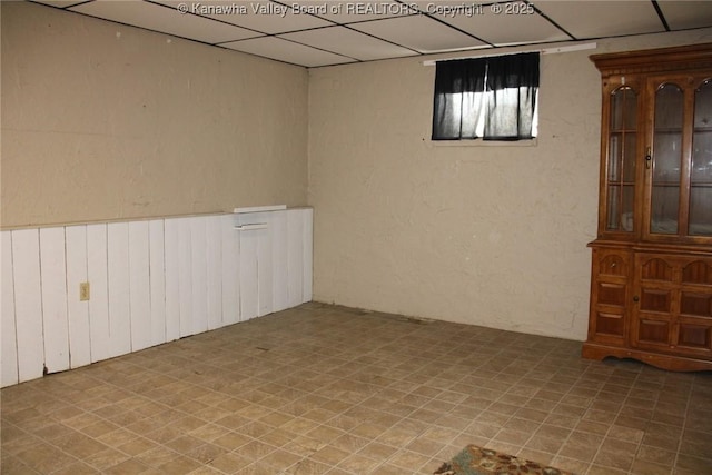 1741 Huber Rd, Charleston, WV 25314 - below grade area with a paneled ceiling and a textured wall