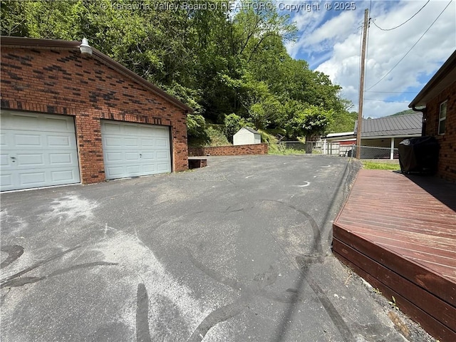 1886 Whitman Creek Rd, Whitman, WV 25652 - garage featuring fence
