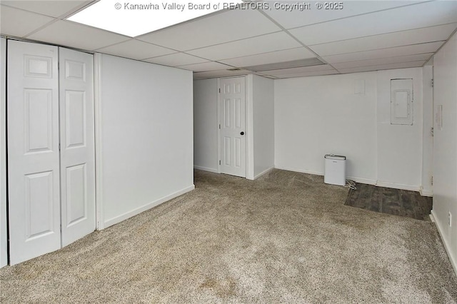 4707 A Marklana Ln, South Charleston, WV 25309 - finished basement featuring carpet, electric panel, baseboards, and a paneled ceiling
