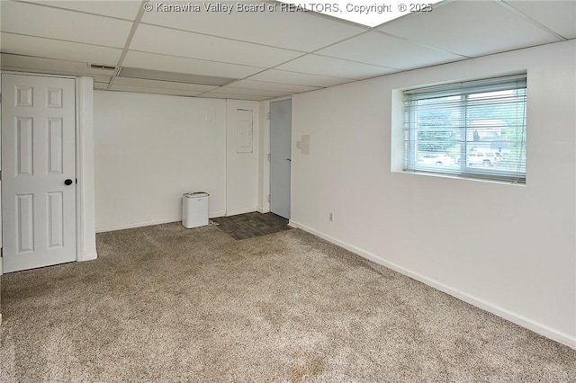4707 A Marklana Ln, South Charleston, WV 25309 - carpeted empty room featuring a paneled ceiling and baseboards