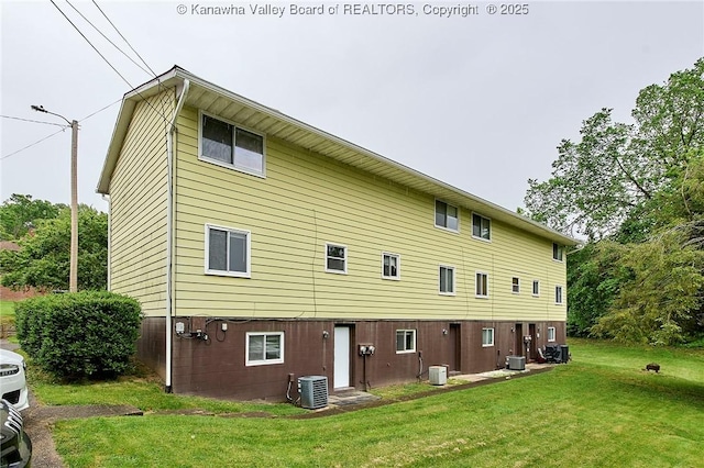 4707 A Marklana Ln, South Charleston, WV 25309 - back of property with a yard and central AC