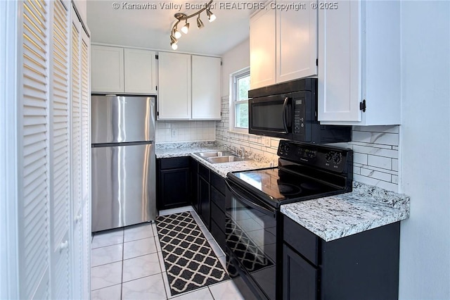 4707 A Marklana Ln, South Charleston, WV 25309 - kitchen featuring black appliances, a sink, decorative backsplash, and white cabinetry