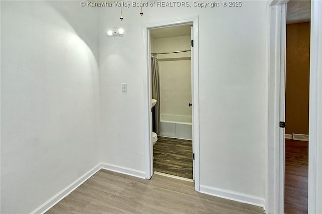 4707 A Marklana Ln, South Charleston, WV 25309 - hallway featuring wood finished floors and baseboards