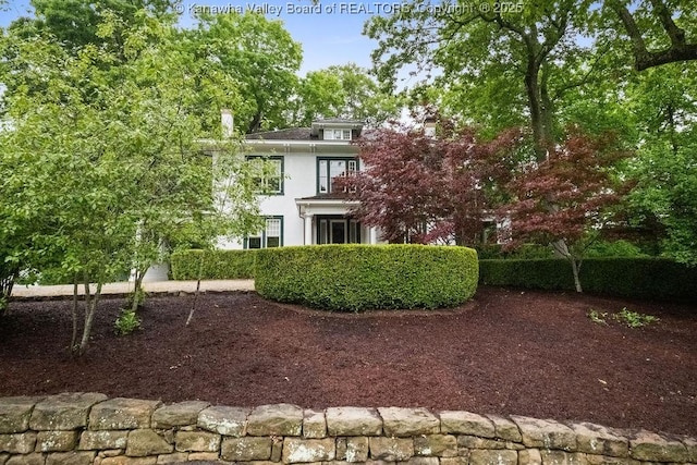 1223 Staunton Rd, Charleston, WV 25314 - back of house featuring stucco siding and a chimney