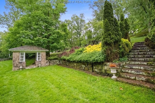 1223 Staunton Rd, Charleston, WV 25314 - view of grassy yard with an outdoor structure and stairway