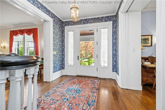 1223 Staunton Rd, Charleston, WV 25314 - entryway featuring wallpapered walls, wood finished floors, ornamental molding, and wainscoting