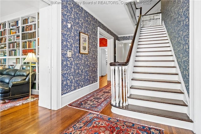 1223 Staunton Rd, Charleston, WV 25314 - stairway with wallpapered walls and wood finished floors