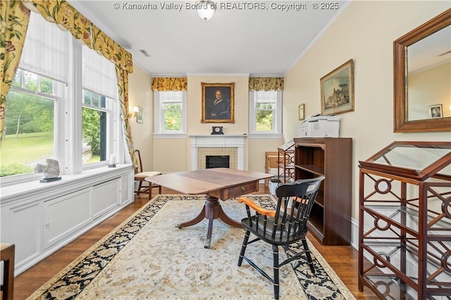 1223 Staunton Rd, Charleston, WV 25314 - home office featuring healthy amount of natural light, wood finished floors, ornamental molding, and a tiled fireplace