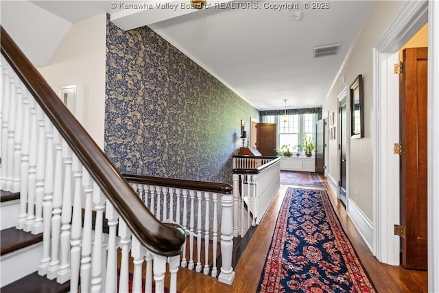 1223 Staunton Rd, Charleston, WV 25314 - hallway featuring wood finished floors, wallpapered walls, and ornamental molding